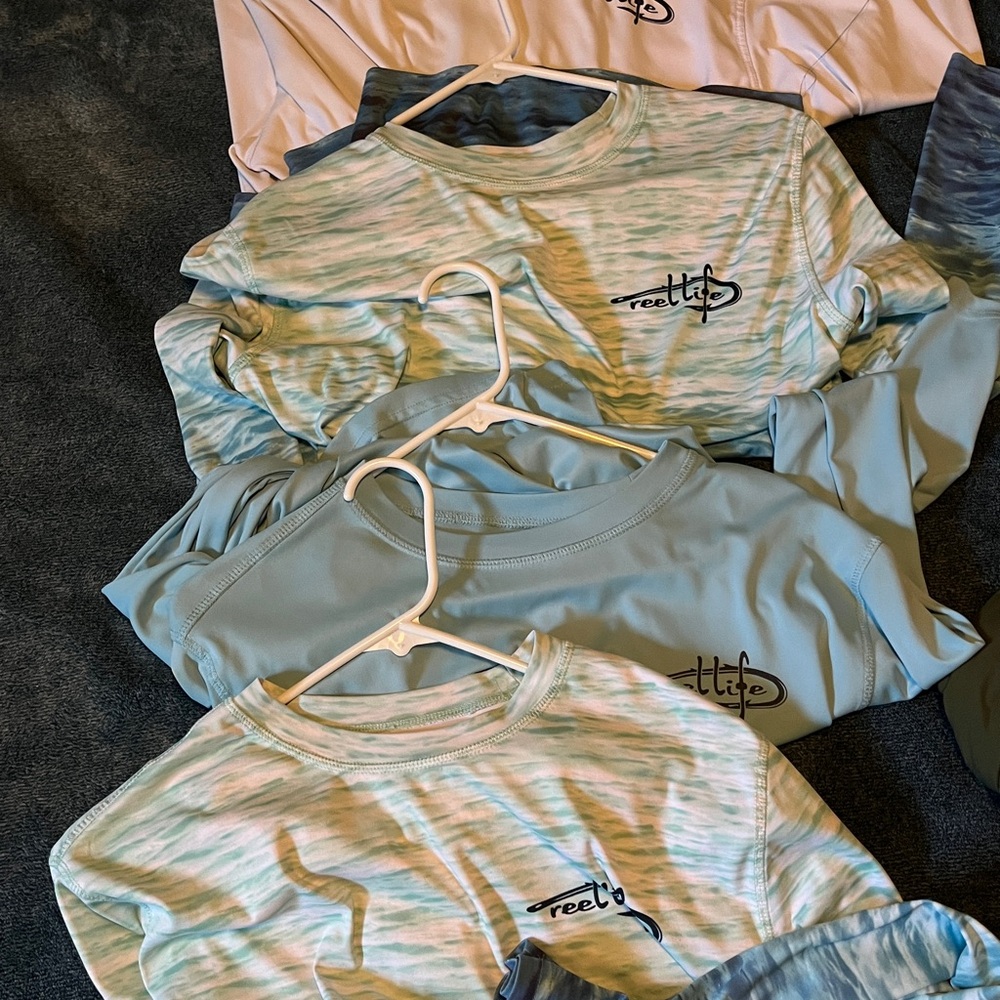 Reel Life 4 shirt package (white, Blue and 2 ocean colored shirts)